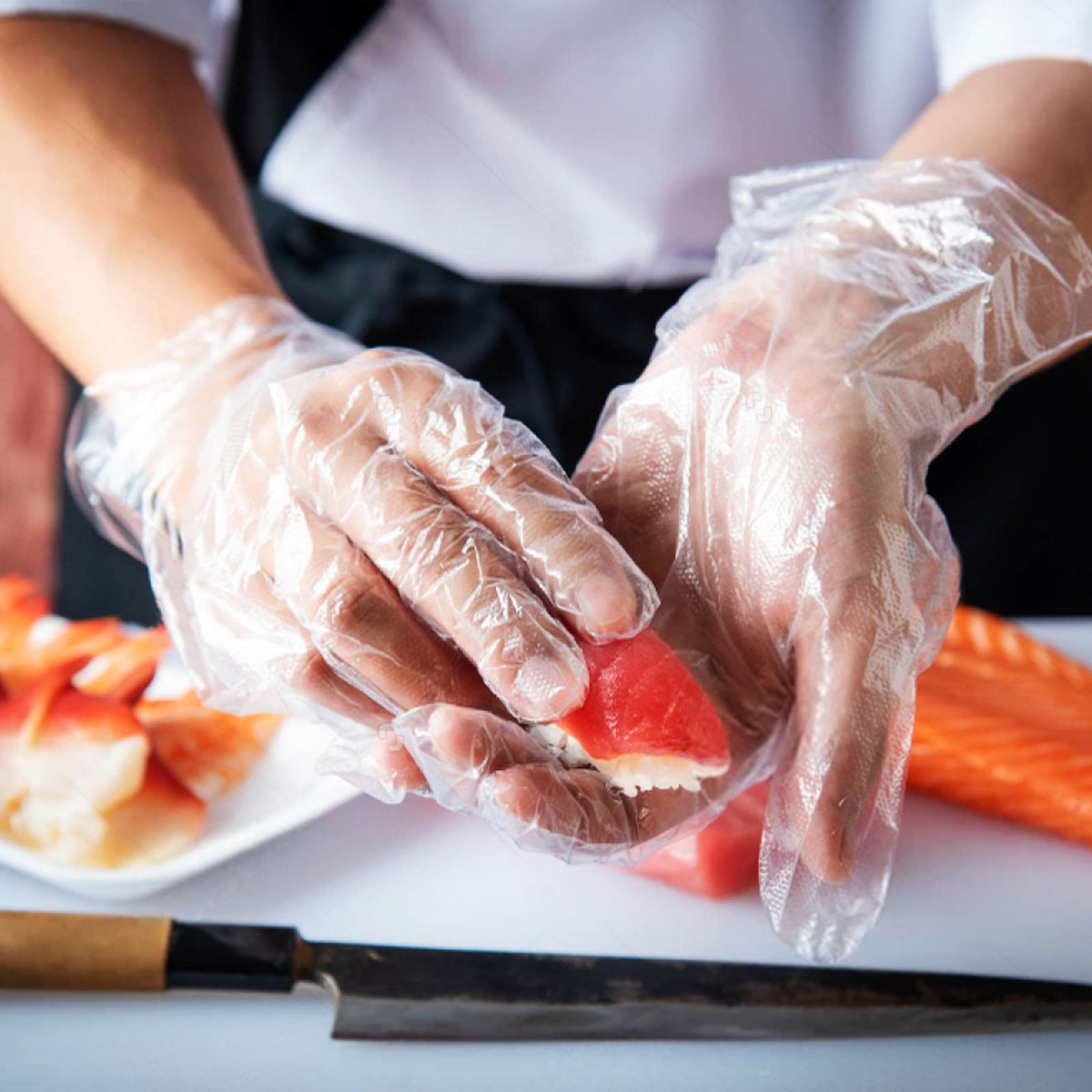 Disposable transparent plastic gloves