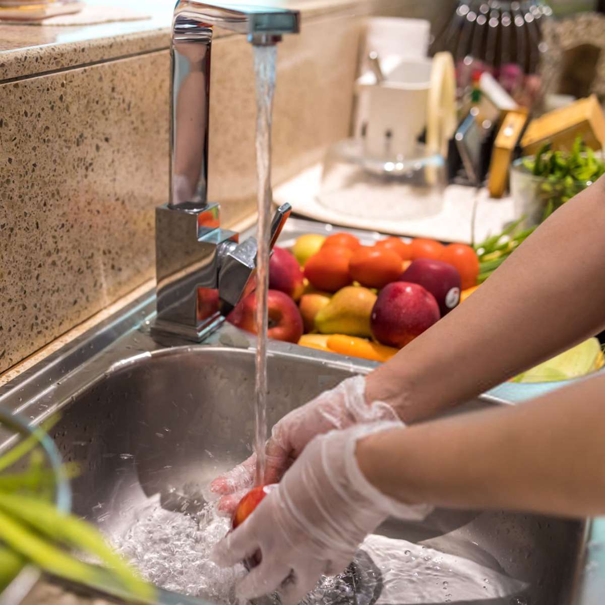 Disposable transparent plastic gloves
